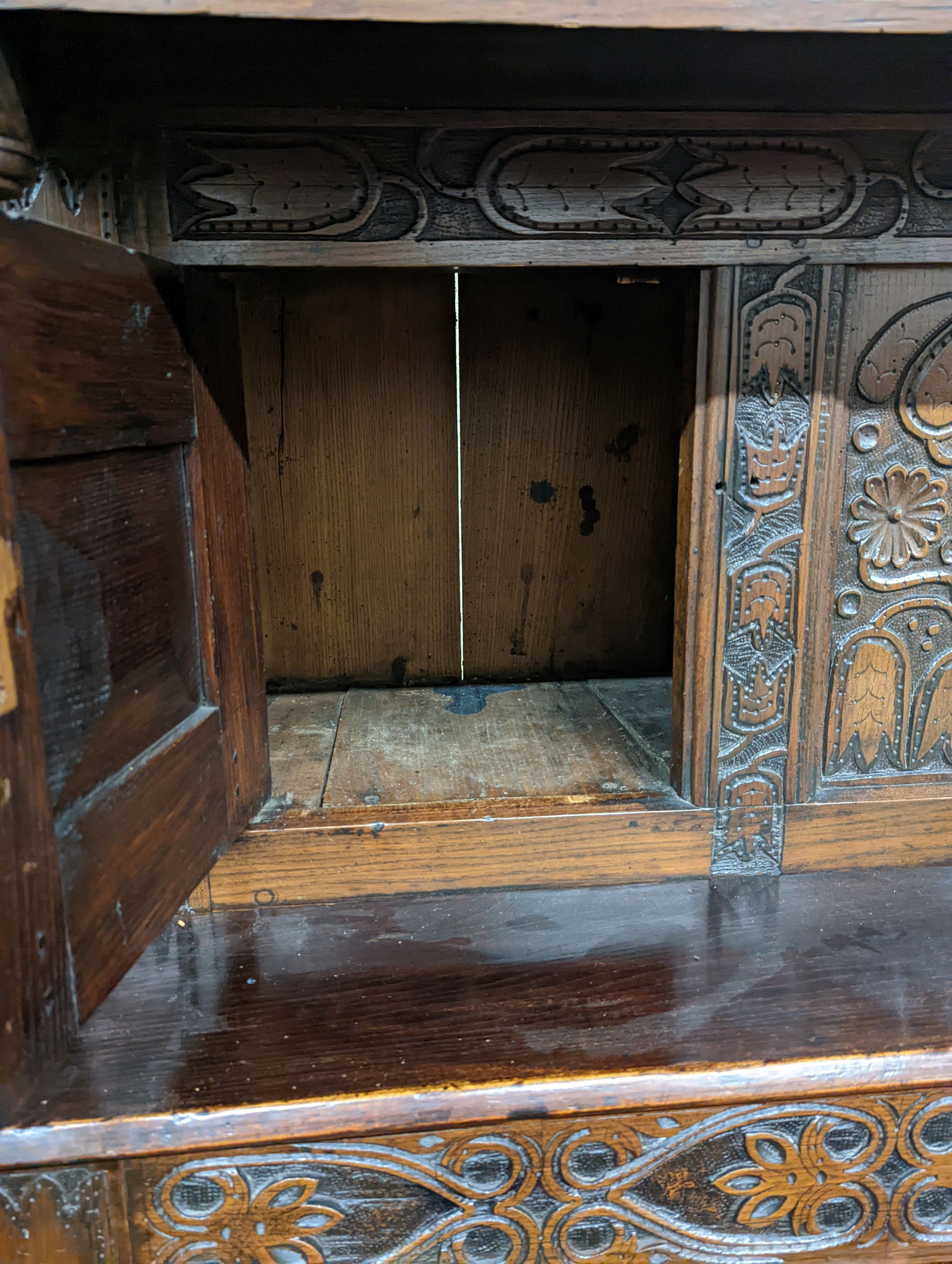 A 17th century and later oak court cupboard, width 129cm, depth 50cm, height 180cm